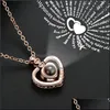 Pendentif Colliers 100 Langues Je T'aime Collier Femmes Cuivre Coeur Mémoire Projection Cou Chaînes Bijoux De Mode 829 Q2 Drop Del Dhwfj