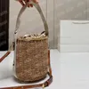 Borse a secchiello di lusso da donna con coulisse Woody C Tote Borsa a tracolla in paglia con tracolla di design Borsa a tracolla estiva Borsa a cilindro