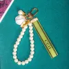 Trendy Keychain Luxury Designer Keys Pendant Key Buckle Classic Letter Fabric Pearls Chain 4 Styles Keychains Ornaments