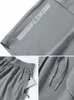 Shorts pour hommes Poches zippées d'été Hommes culottes courtes vêtements de sport respirant séchage rapide Capris pantalon étiré en nylon entraînement gymnase décontracté 6XL Y2302