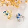 S3410 Modna biżuteria dla kobiet pierścienie Emaliki motylki kwiat otwierający się Pierścień Adustable