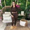 2023 Spring Fall Designer dames tracksuits 2 -delige broek set sexy holle gat crop top top taille strakke leggings bodysuits