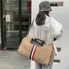 Tasarımcı Çanta Mağazası% 60 İndirim Taşınabilir Büyük Kapasiteli Seyahat Erkekler Kısa Mesafe İş Gezisi Messenger Kadın Giysileri Depolama Biniş Bagaj Çantası