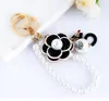 Keychains XDPQQ Korea Creative Tea Tree Flower Pearl Keychain Pendant Metal Par Fred22