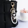 Keychains XDPQQ Korea Creative Tea Tree Flower Pearl Keychain Pendant Metal Par Fred22