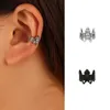 Boucles d'oreilles à dos foncé vent personnalité métal Non troué Clip d'oreille Ins tendance chauve-souris écouteur unique unisexe