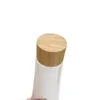 60g 80g Tubes cosmétiques en plastique bouteille tuyau de compression nettoyant pour le visage tubes d'extrusion rechargeable voyage baume à lèvres conteneur avec capuchon en bambou
