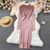 Casual jurken breien met lange mouwen uit holte uit sexy dames maxi jurk elegant chic bodycon mode geribbelde massief zwart gewaad pullover vestidos y2302