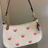 Schoudertassen 2023 Nieuwe Teri Chain Love Mahjong Bag Glacier White Contrast Stick Armpit Bag voor vrouwen