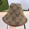 Diseñador sombrero de cubo para hombre y para mujer sombreros moda estilo clásico diseño de impresión de letras regalo de sombrilla al aire libre dar reunión social aplicable ccc10