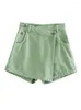 Kvinnors shorts kvinnor mode asymmetriska kjolar höga midjeknappar fickor vintage kvinnlig skort vanlig godis färg