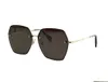 Hommes lunettes de soleil pour femmes dernière vente mode lunettes de soleil hommes lunettes de soleil Gafas De Sol verre UV400 lentille avec boîte assortie aléatoire 52