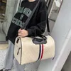 2023 Purses Clearance Outlet Online Sale Stylish one-shoulder portable travel Men's and women's large capacity independent shoe warehouse cloth sports bag