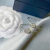 925 trébol de plata diseñador de lujo aro pendientes huggie para mujer L marca OL estilo brillante cristal diamante oreja anillos pendiente fiesta boda joyería