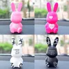 Dekorationer VENTS PARFUM CLIP AIR FRESHENER Rabbit Auto Interior Fragrance Smak Söt Toon Dolls Car Ornament Accessories Gifts 0209