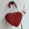 Bolso de mano con forma de corazón de marca a la moda para mujer, nueva tendencia de 2023, bolsos cruzados de cuero Pu, bolso pequeño de hombro para mujer, bolsos bonitos 230209