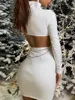 Sıradan elbiseler kadınlar bodycon mini elbise uzun kollu sahte boyun kesimi arkasiz kulüp kalça ile metal zincir