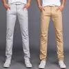 メンズパンツクラシックカジュアルメン春秋のビジネスファッションソリッドカラーパンタロンのためのストレートジーンズのズボン