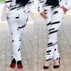 Pantalon deux pièces femme mode femme noir blanc rayé imprimé épaule veste pièce ensemble 230209
