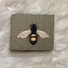 Bolsas de carteiras curtas de abelha estampada cl￡ssica para masculinos para homens para mulheres carteiras de chave de couro real para homens tamanho 11x9cm264w