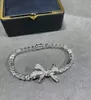 Elegantes Eisdiamant-Tilda-Bogen-Armband, weiblich, 925er Sterlingsilber, Zirkon-Kettenschmuck, Hochzeit, Kristall-Bogenknoten-Tennis-Armband