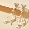 Boucles d'oreilles étalon 2023 Bijoux d'oreille bijoux Butterfly Drop simulé Perle longue Metal Tessel Crystal for Women Gift