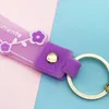 Sac Longe Porte-clés Anneaux Doux PVC Jelly Happy Moment Lettre Fleur Porte-clés Cadeaux DIY Porte-clés pour Pendentif Charms Femmes Bijoux Accessoires Clés De Voiture Titulaire