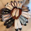 2023サマースリッパの女性靴フラットヒール漁師靴スプリングヘンプロープ編み片足ペダル太いゆっくり革シングルデザイナーシューズウォーキング34-42