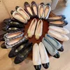 2023Summer Slippers vrouw schoenen platte hak visser schoen veer hennep touw gevlochten een voet pedaal dikke lederen lederen enkele designer schoen Walking 34-42