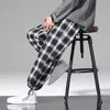 Mäns byxor sommarpläden män mode lös hip hop casual byxor koreanska manliga harem pant all-match bekväma joggar streerwear y2302