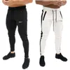 Calça masculina masculina fitness casual slim running tereling calças homens calças de moletom