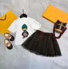 Роскошные дизайнерские комплекты детской одежды Футболка с вуалью Юбка Мода Британский модный бренд Летние детские сокровища Хлопковая рубашка из двух частей для девочек Плиссированная юбка