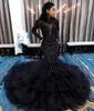 Luxus schwarze Abschlussballkleider 2023 Langarme Paillette Meerjungfrau Party Kleider Hochhals Quasten Abendkleider Vestido de Soiree