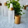 Garrafas de armazenamento embalagem de cosméticos ecológicos 120ml 100ml 150ml Bomba de bambu e jarra com tampas de madeira naturais superiores