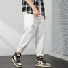 Jeans masculin hommes Ripped Harlan Black Streetwear Fashion Pantalons Casual Wild Baggy Hole Denim Pantalon Vintage Simple classique blanc