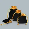 Bolsas de jóias 20pcs Velvet Gold Gold Triarstring bolsa para sacos de presente Black Christmas/Casamento 7x9cm 8x10cm 10x12cm 12x16cm