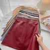Skirts Women Solid A-line PU Leather Skirts Above Knee Skirt With Linning Female Mini Skirts Bottoms For Girls Autumn Winter 230211
