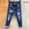 Dsquare jeans dsquare jeans d2 mens jeans denim rippade jeans för män mager trasiga Italien stil hål cykel motorcykel rock väckelse pa obt