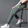 Men's Pants Ice Silk Summer Thin Section Trend Wild Loose Casual Sports Quick-drying Harlan Nine-point 5XLMen's Drak22