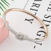 Bangle nieuwe roestvrijstalen sieraden kristallen armbanden gieten concentrische knooppand voor vrouwen die van geschenken houden groothandel G230210