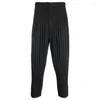 Pantalones de diseño para hombres Top pantalones para hombres Miyake pliegue Man pantalón Homme plisse issey tela plisada moda moda para hombres y femeninos harajuku pantalones lápiz 108