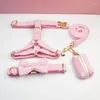 pink collar and leash