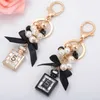 Key Rings New Creative Perfume Bottle Key Chains Fashion Beads Keychain Bowknot Key Ring Women Bag Charm Car Keyring Pendant Gifts G230210