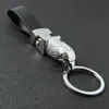 Nyckelringar Lyxiga bil Key Chain Men Kvinnor Keychain Högklassig leopard för nyckelringar Purväskor Charm Bag hängsläder Rope Fathers Day Gift G230210