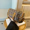 2023 Femme Luxury Designer Bolsa Crossbody Sacos para mulheres Comprador de couro Bolsas de aba pequenas