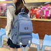 Torby szkolne torby książki nylonowe plecak hurtowy dziewczęta plecaki luksusowe torebki projektant ramion podróży dla kobiet 2023