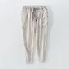 Мужские брюки летние мужские повседневные карандашные карандашные талию прямая шнурка с тонкой брюки с твердым цветом белых брюк.