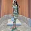 カジュアルドレスアンジャマノールファッションプリントメッシュシアー半袖ボディコンドレスグリーンセクシーな夏、女性のための長いドレスを見るD83-BC13T230210