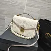 2023 Purses Clearance Outlet Online Sale Hot High Quality Woman Pr￤gling Mycket Interlayer Handbag Messenger Girl Purses Lady Bag med Pearl Strap