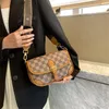 2023 Femme Luxury Designer Bolsa Crossbody Sacos para mulheres Comprador de couro Bolsas de aba pequenas